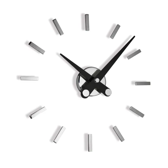Nomon Puntos Suspensivos wall clock